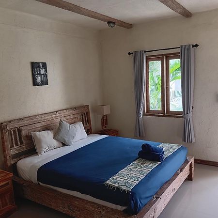Adore Guesthouse Amed  Room photo