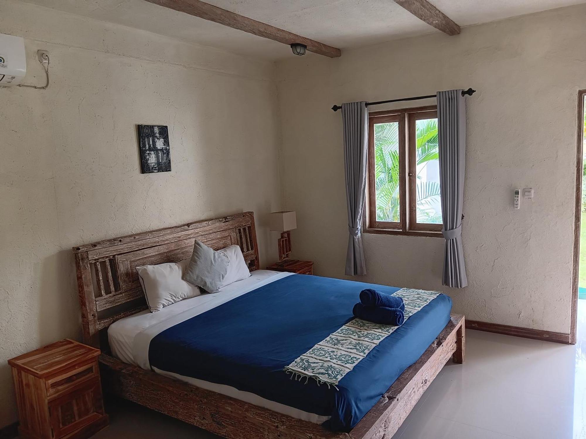 Adore Guesthouse Amed  Room photo
