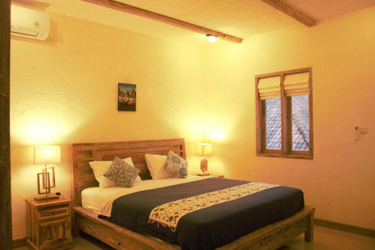 Adore Guesthouse Amed  Exterior photo